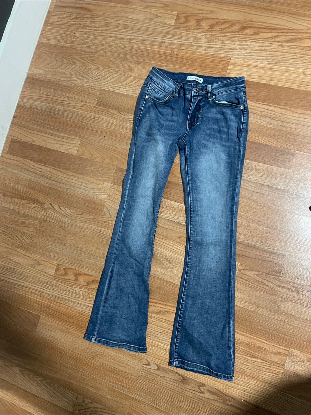 Flared Blue Denim Jeans with Subtle Wash